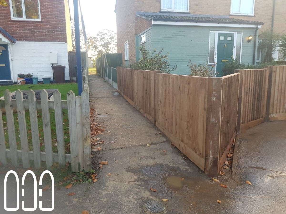 Close board fencing with wooden posts and gravel boards