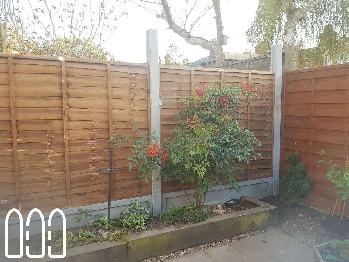 Grange waney fencing with concrete posts, gravel boards and a diamond trellis installed