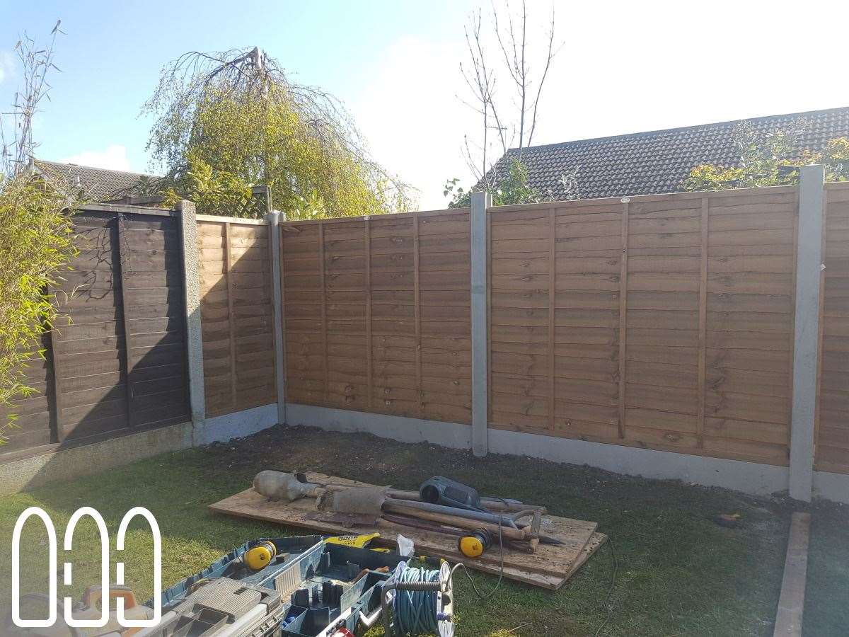 Grange waney fencing with concrete posts and gravel boards