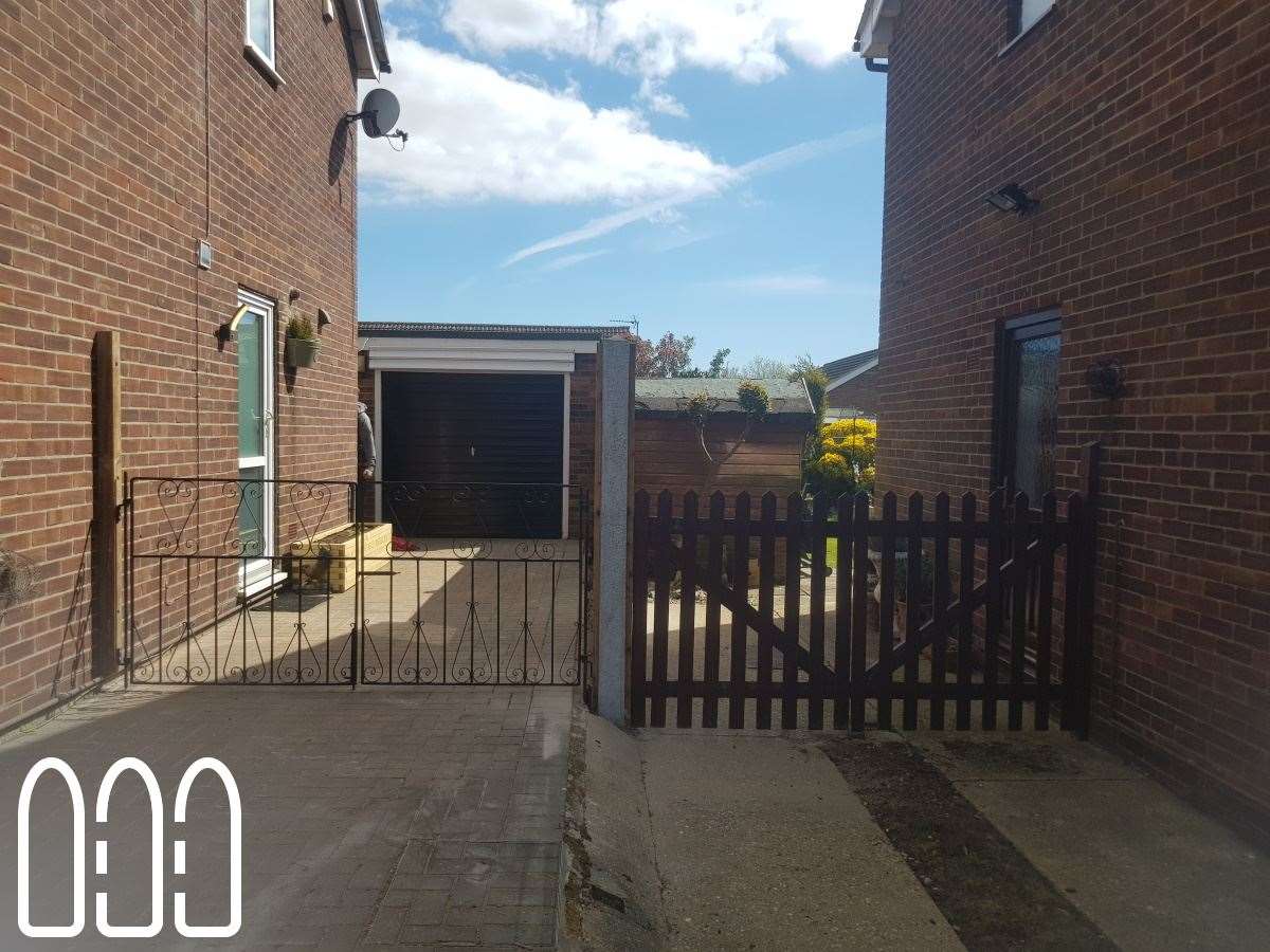 Grange waney fencing with concrete posts and gravel boards