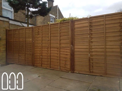 Grange waney fencing with wooden posts